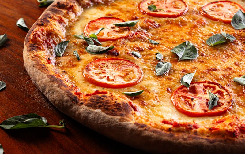 Margherita pizza with fresh tomato and basil at Via 313