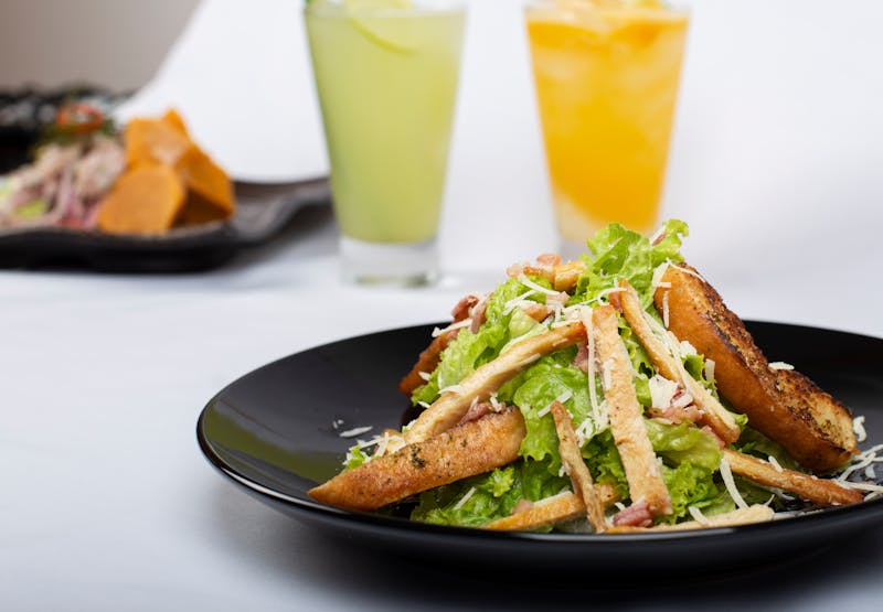 Fresh Caesar salad served at Via 313 Austin restaurant